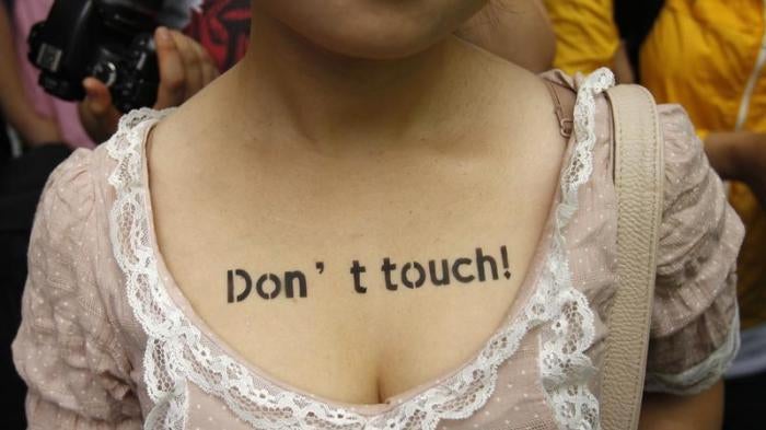 A woman takes part in a SlutWalk protest, in central Seoul July 16, 2011.