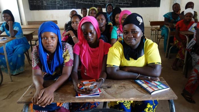 Students enrolled in the final year of lower secondary school in the classroom in a village in Kolda region, southern Senegal. Adolescent mothers and married girls study in this school. 