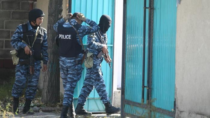 Counterterrorism police carry out a search in Bishkek, Kyrgyzstan on October 16, 2015. 