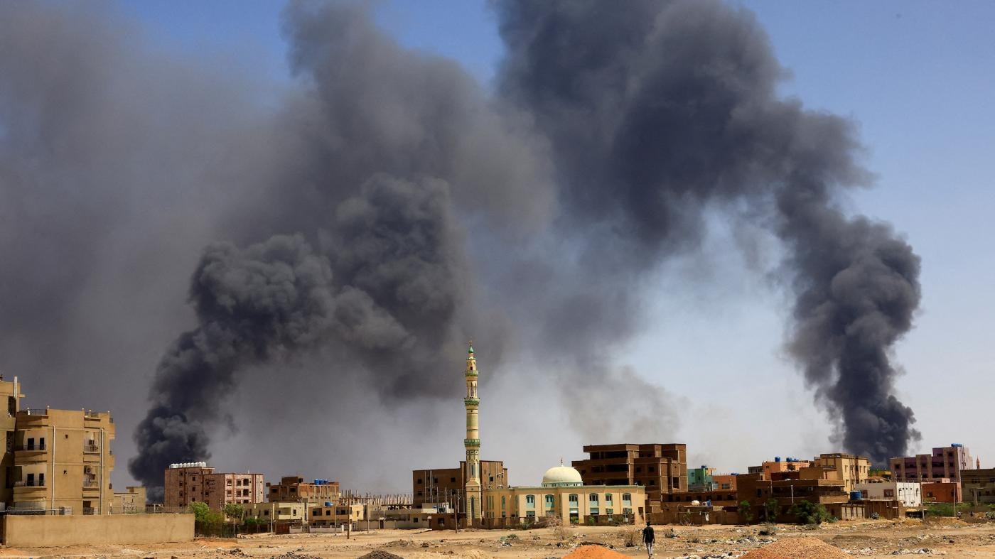 Smoke rises above buildings after an aerial bombardment during clashes between the Sudan Armed Forces and the Rapid Support Forces in Khartoum, Sudan.