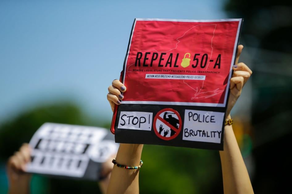 Protesters gather outside of the Queens County Criminal Court on June 8, 2020, in the Queens borough of New York.