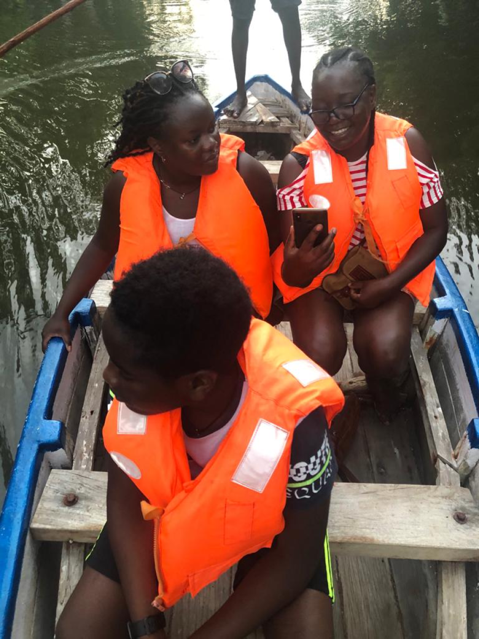 Author Audrey Wabwire, her sister Vicky, and Wabwire's son. 