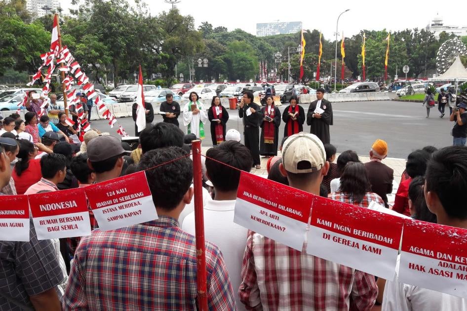 Indonesia's religious minorities, including Christians, Ahmadis, Buddhists and native faith believers, celebrate Indonesia’s Independence Day outside the State Palace in Jakarta