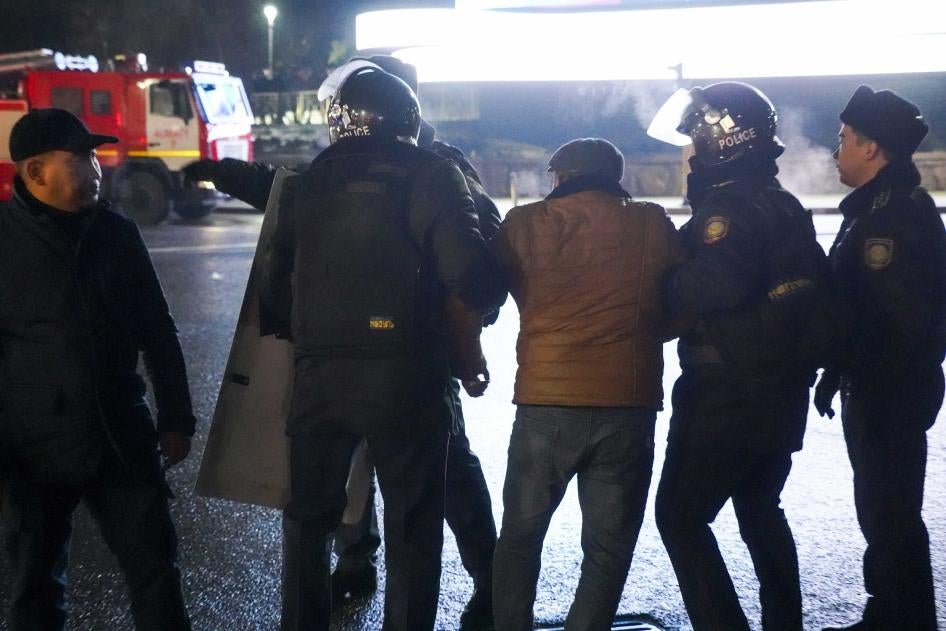 Police detain a protester in the center of Almaty, Kazakhstan, on Wednesday, Jan. 5, 2022.