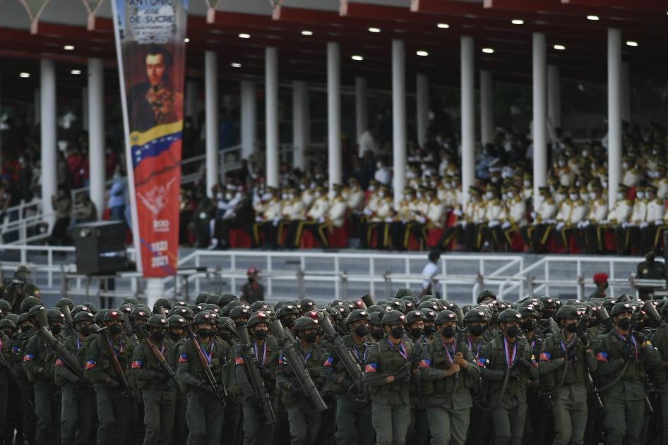 Soldiers march during a military parade marking Independence Day in Caracas, Venezuela, Monday, July 5, 2021. (AP Photo/Matias Delacroix)
