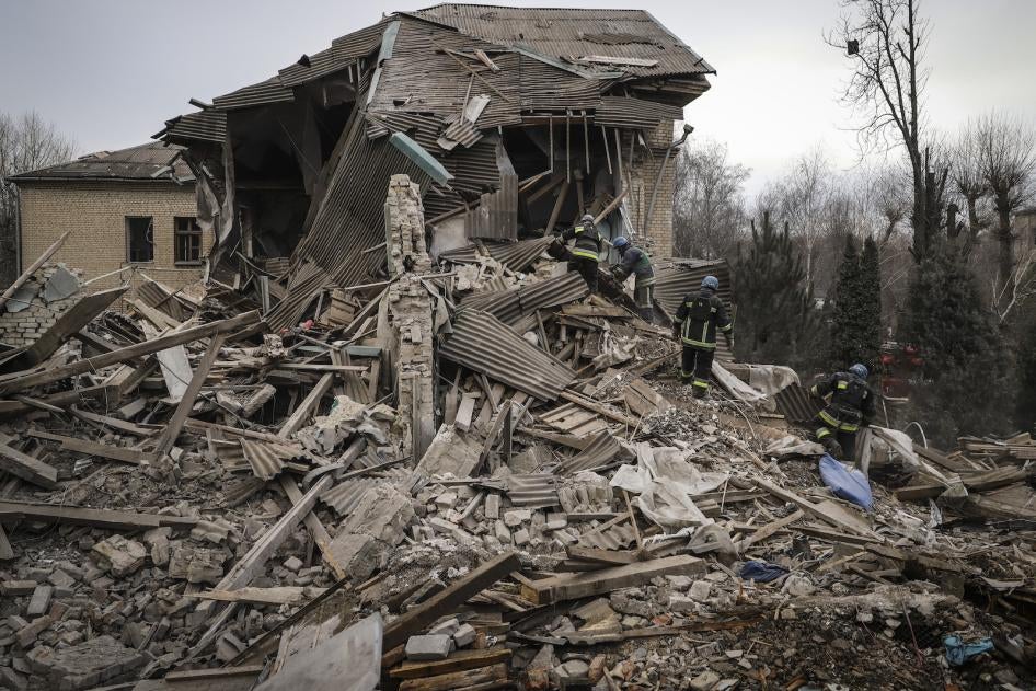 Ukrainian firefighters work at a damaged hospital maternity ward in Vilniansk, Zaporizhzhia region, Ukraine.