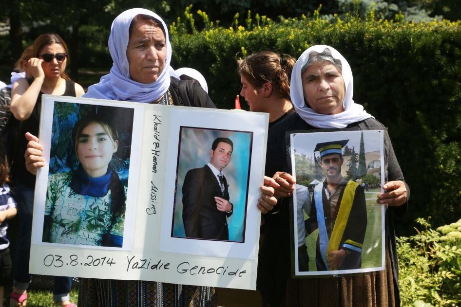 Members of the Yazidi community from Iraq who escaped persecution by ISIS hold a rally outside Queen's Park in Toronto, Canada, August 4, 2019.