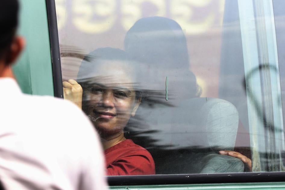 NagaWorld's union leader, Chhim Sithar, sits in a prisoner van outside the municipal court in Phnom Penh, Cambodia.
