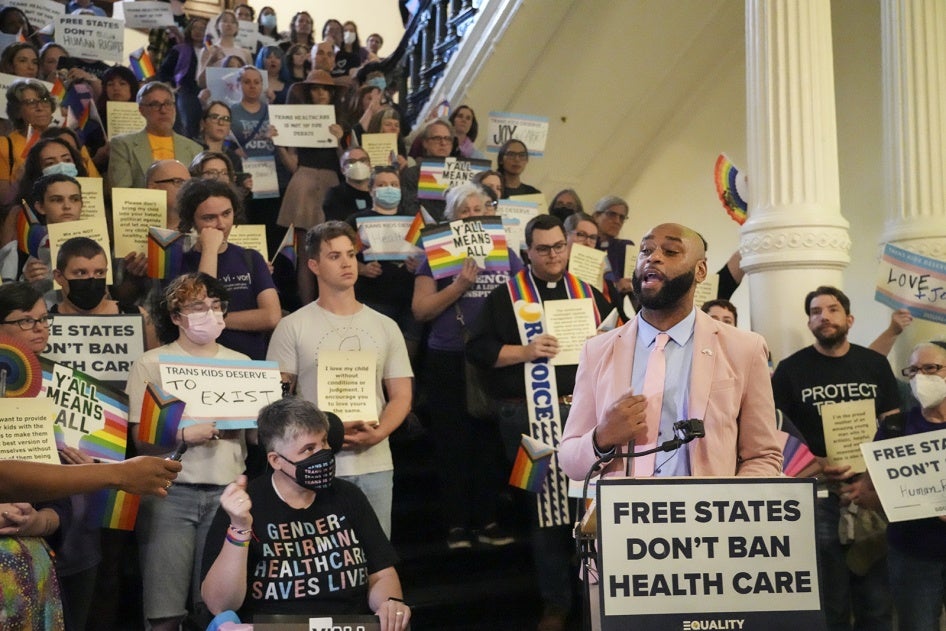 Texas State Rep. Christian Manuel joins LGBTQ+ activists to protest Senate Bill 14, which bans gender-affirming medical care for transgender youth, at the Texas State Capitol, in Austin, May 12, 2023.