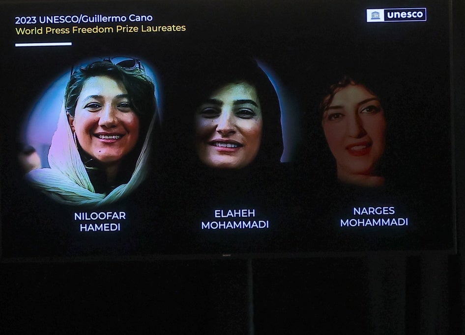 Three imprisoned Iranian female journalists, Niloofar Hamedi (L), Elaheh Mohammadi (C) and Narges Mohammadi during the award ceremony of the UNESCO/Guillermo Cano World Press Freedom Prize.