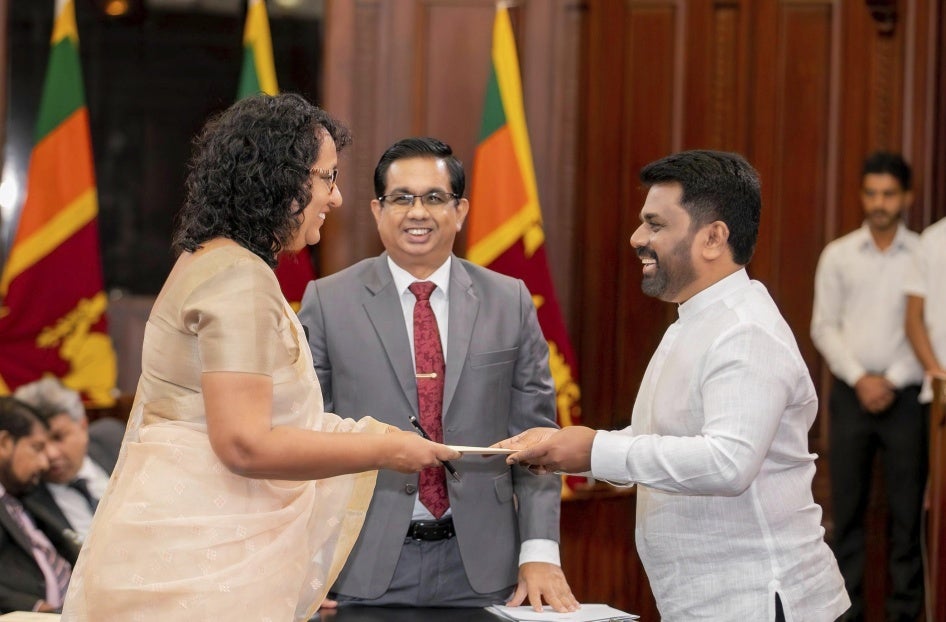 Sri Lankan President Anura Kumara Dissanayake (right) and Prime Minister Harini Amarasuriya during the swearing-in of the new cabinet members on November 18, 2024, in Colombo, Sri Lanka.