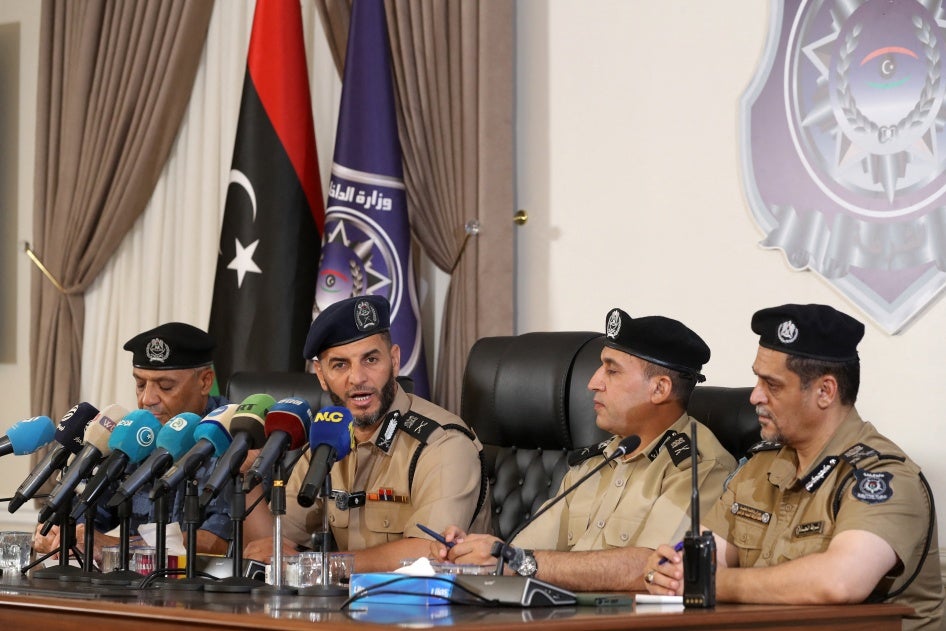  Emad Trabelsi (2nd-L), acting interior minister in the Libyan Government of National Unity, holds a press conference in Tripoli, August 23, 2024.