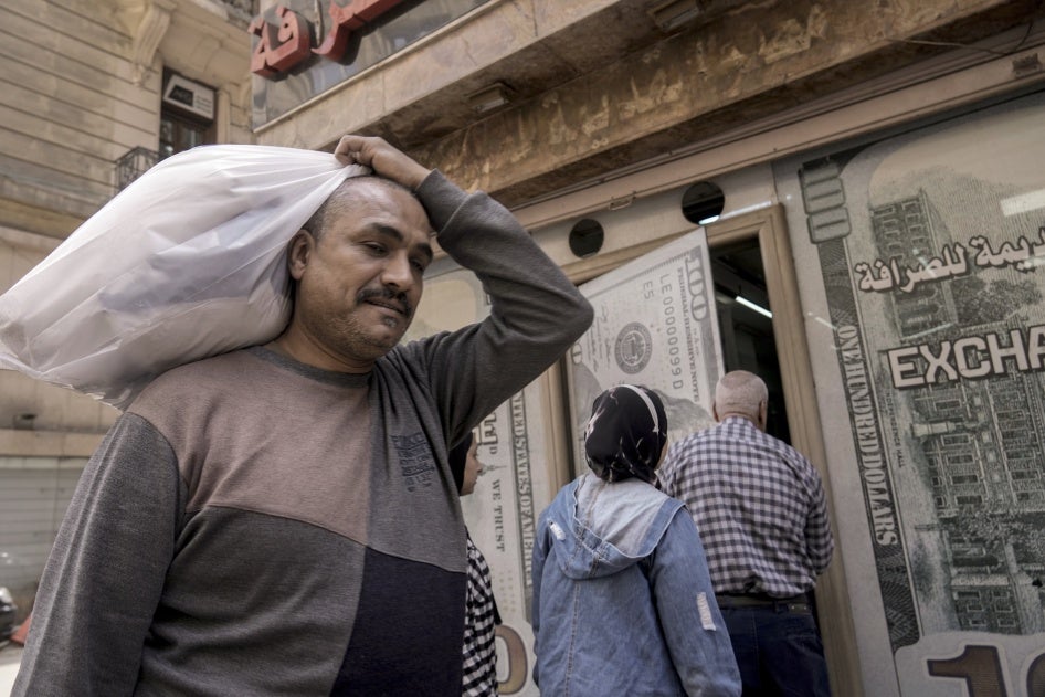 A man walks past an exchange office in Cairo, Egypt, March 6, 2024. 