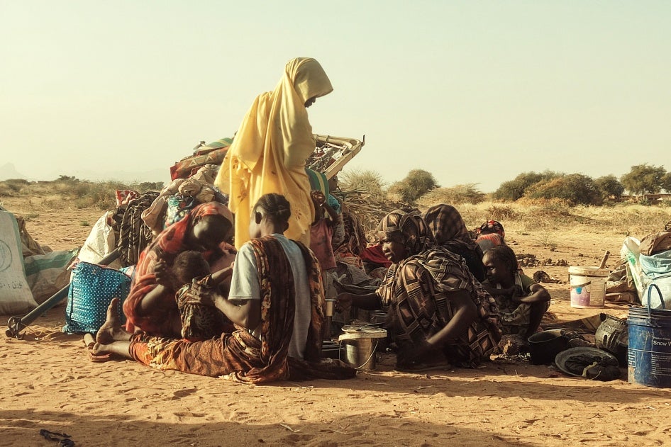 Displaced people who fled the Zamzam camp, gather near the town of Tawila in North Darfur, Sudan, February 14, 2025.