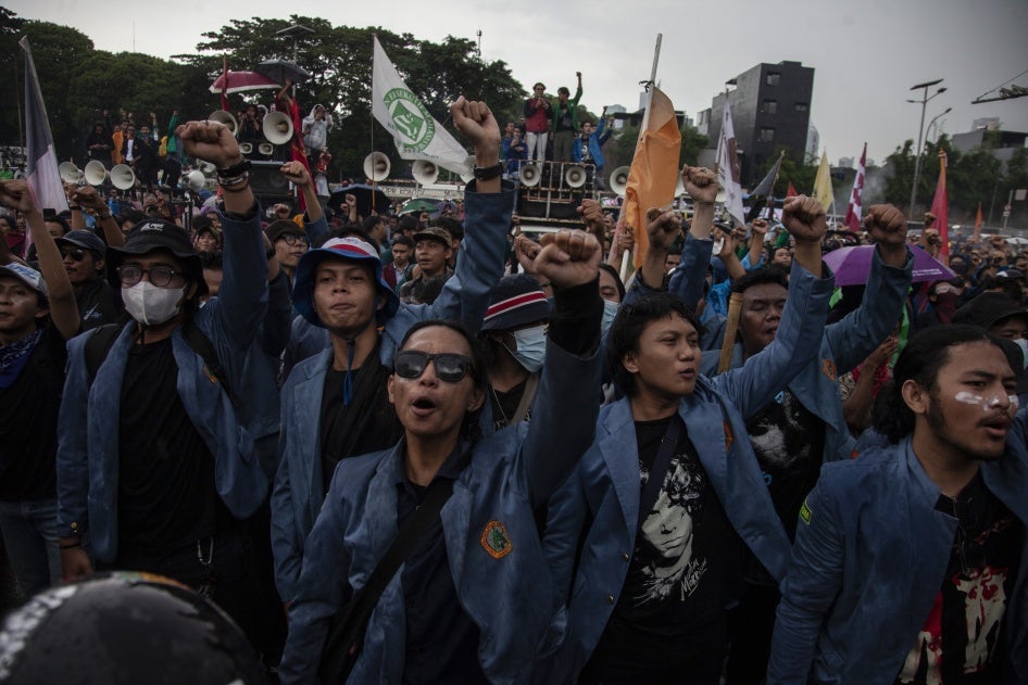 Students protest against a revision to the armed forces law outside the House of Representatives building in Jakarta, Indonesia, March 20, 2025.