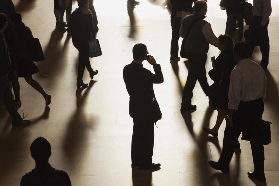A man stands in the middle of Grand Central Terminal as he speaks on a cell phone in September 2013.