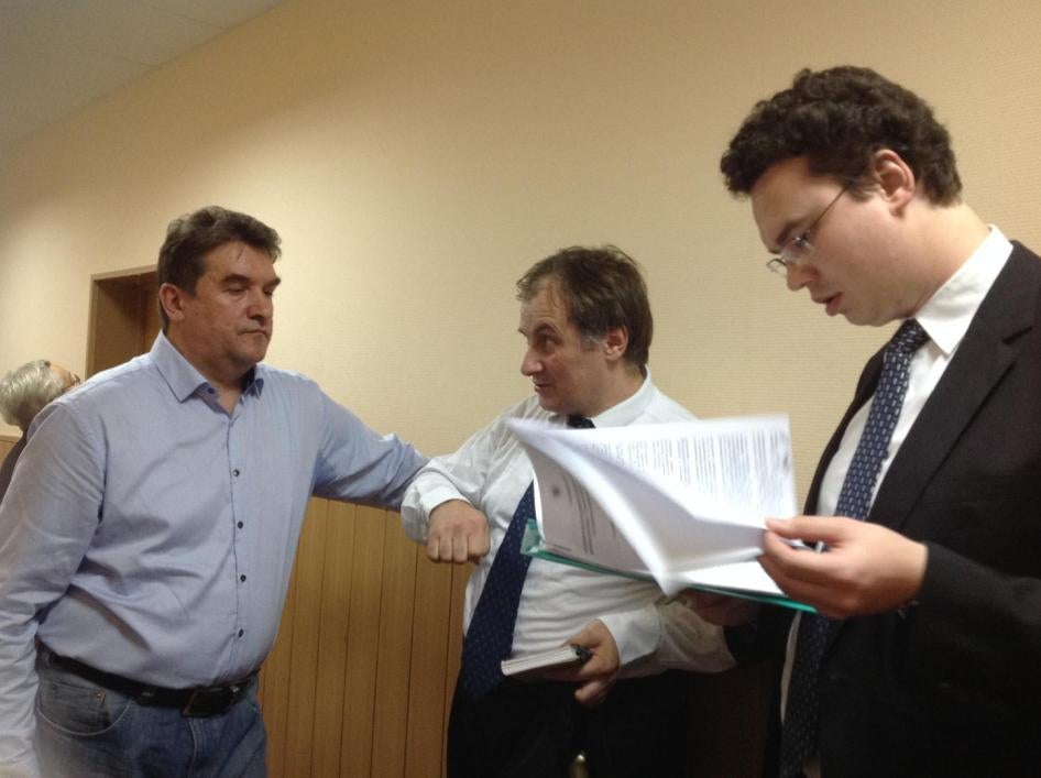 Representatives of Human Rights Center "Memorial" waiting for the court hearing to begin. September 28, 2015, Moscow.