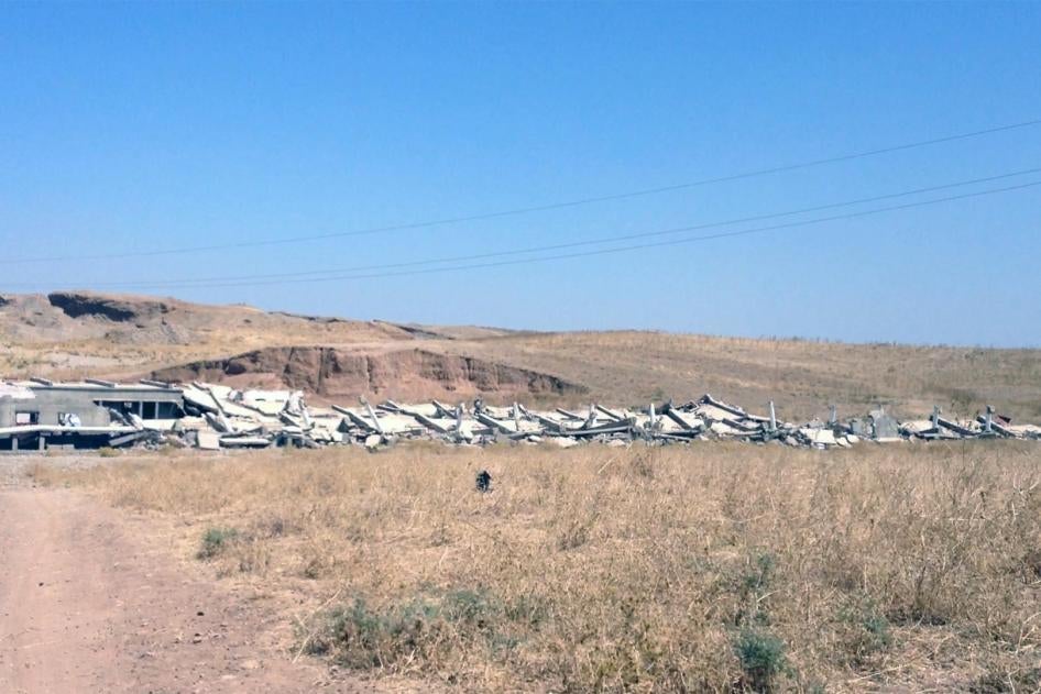 Chicken farm of local ISIS leader who allegedly killed 24 Yezidis close to the farm on Mosul Lake, destroyed by what local residents said were Peshmerga. 