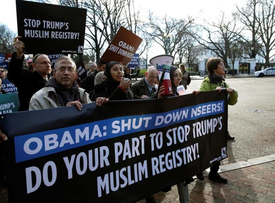 Protesters march past the White House during a protest to shut down the existing Muslim registry program NSEERS in Washington U.S., December 12, 2016.