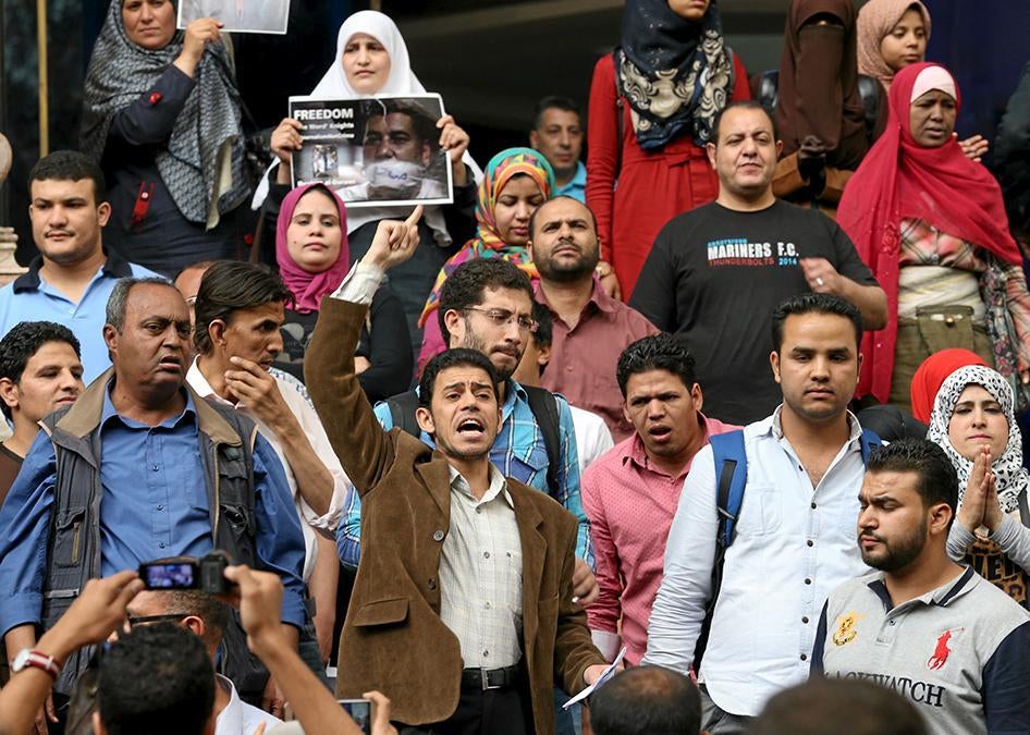 Journalists and activists protest against the restriction of press freedom and to demand the release of detained journalists, in front of the Press Syndicate in Cairo, Egypt on April 26, 2016.