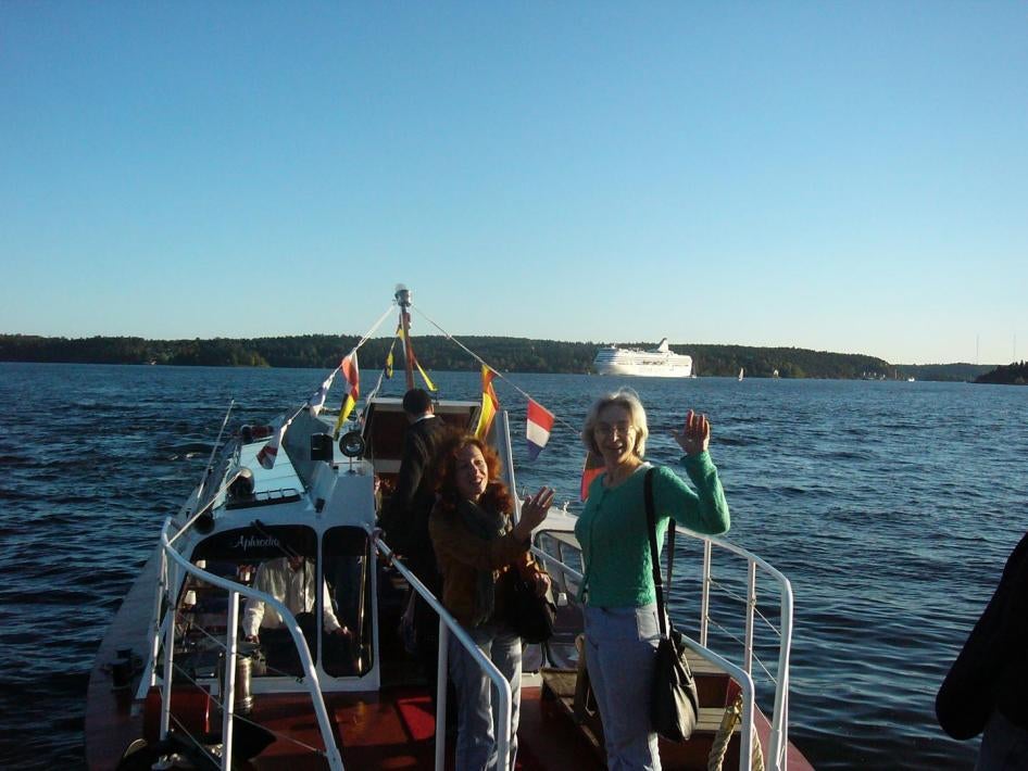 Anna Politkovskaya, right, and Tanya Lokshina on a boat headed to Stockholm in September 2006.