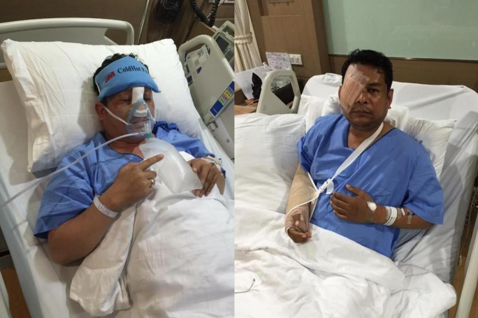 Cambodia National Rescue Party assembly members Kung Sophea and Nhay Chamraoen at a Bangkok hospital after the October 26, 2015 attack outside the Cambodian National Assembly in Phnom Penh. October 29, 2015. © 2015 Human Rights Watch