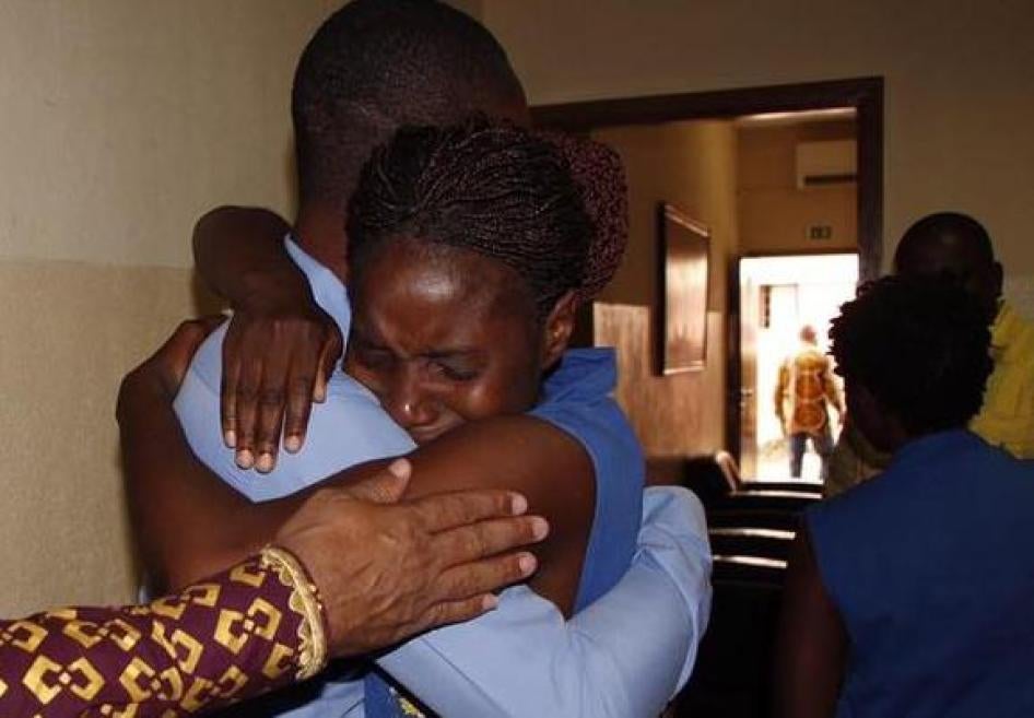 Activist Rosa Conde hugged visitors at Viana jail, April 2016. © 2016 CASA-CE