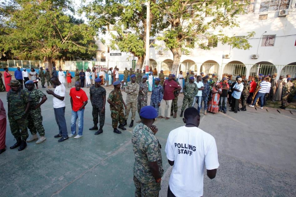 Gambians wait in line to vote during the presidential election in Banjul, Gambia, December 1, 2016.
