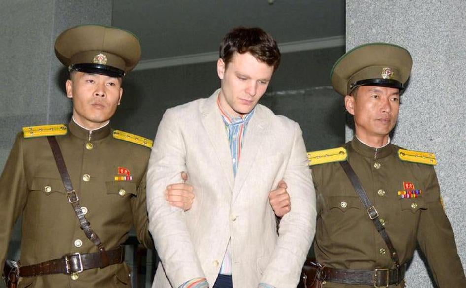 Otto Frederick Warmbier (C), a University of Virginia student who was detained in North Korea and passed away on June 19, 2017, is taken to North Korea's top court in Pyongyang, North Korea, in this photo released by Kyodo March 16, 2016.