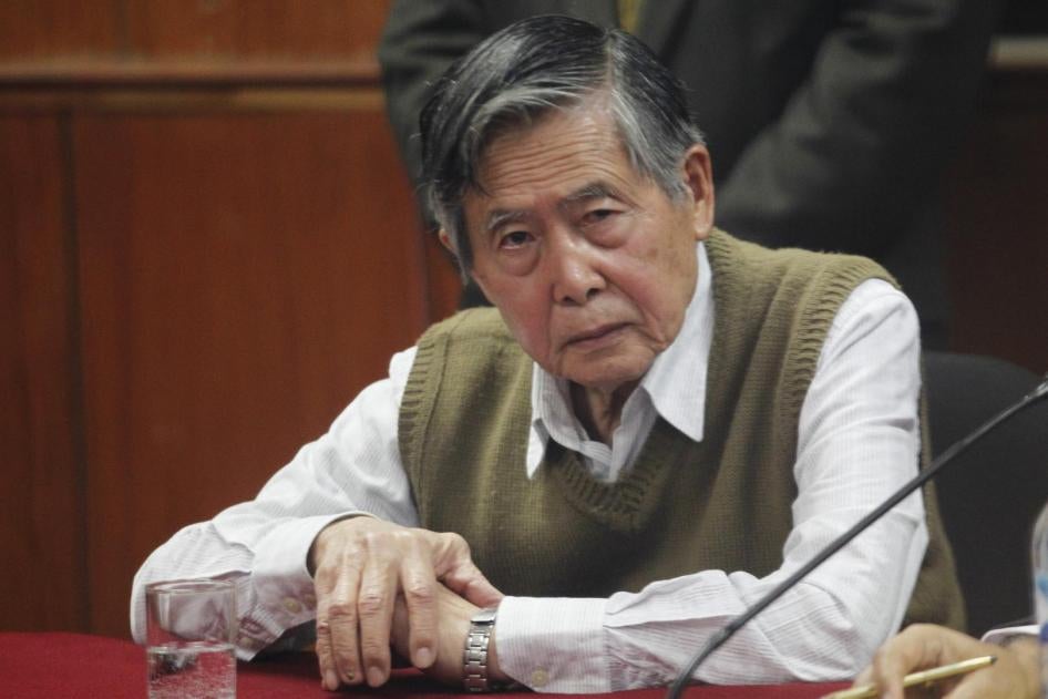 Peru's former President Alberto Fujimori listens to the judge's verdict about his sentence in prison, in Lima October 29, 2013.