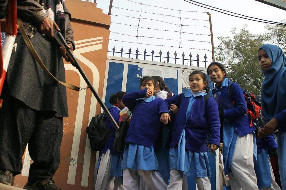 Pakistani students in Lahore return to school under high alert security after the December 16, 2014 attack by the Pakistani Taliban on the Army Public School in Peshawar, January 1, 2015.