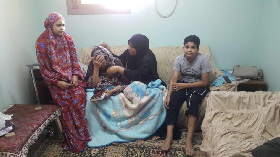 Hajar Mansoor Hasan (second from right), apparently targeted by authorities in retribution for the human rights work of her son-in-law, Sayed al-Wadaei. Also pictured are Hasan’s children, aged 13 and 11, and mother, 90. 