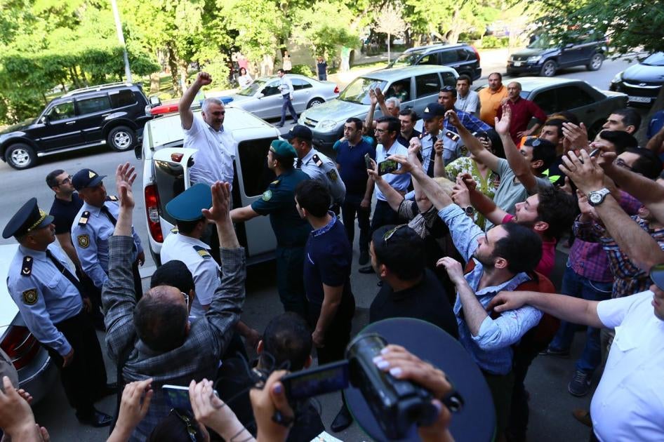 Azerbaijani journalist Afgan Mukhtarli is brought to the court after he has been abducted in Georgia and forcibly taken to neighboring Azerbaijan where he was detained in custody.