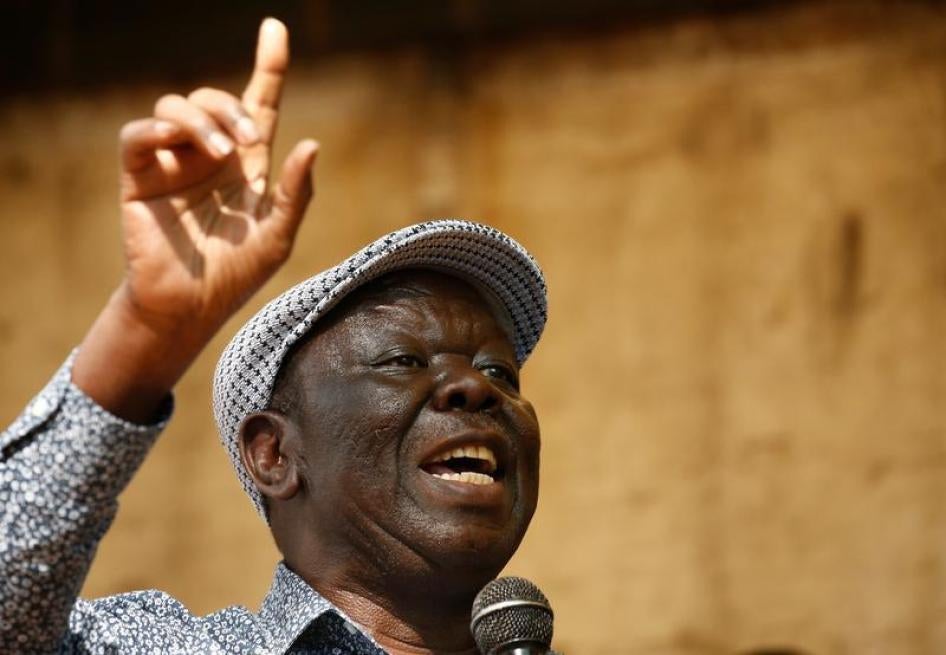Opposition Movement for Democratic Change leader Morgan Tsvangirai addresses a crowd gathered outside parliament in Harare, Zimbabwe, November 21, 2017.