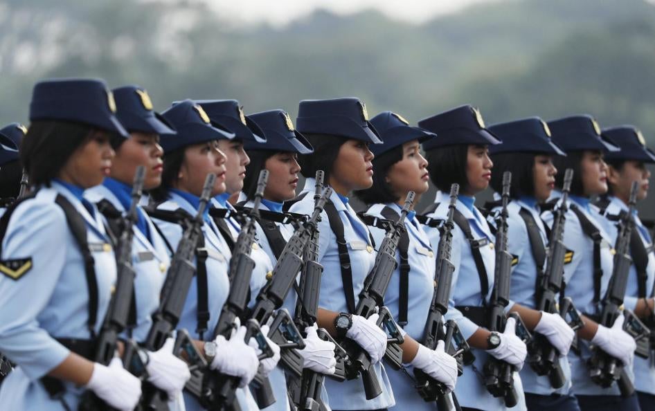 Members of the Indonesian Air Force march during celebrations marking the 70th anniversary of the Air Force in Jakarta, Indonesia, April 9, 2016.