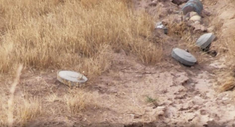 Landmines and unexploded ordinance on the paths around al-Hota, July 2017.