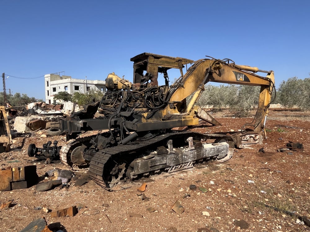 A destroyed excavator from Israeli strikes on August 6, 2025 on Deir Seryan, southern Lebanon.