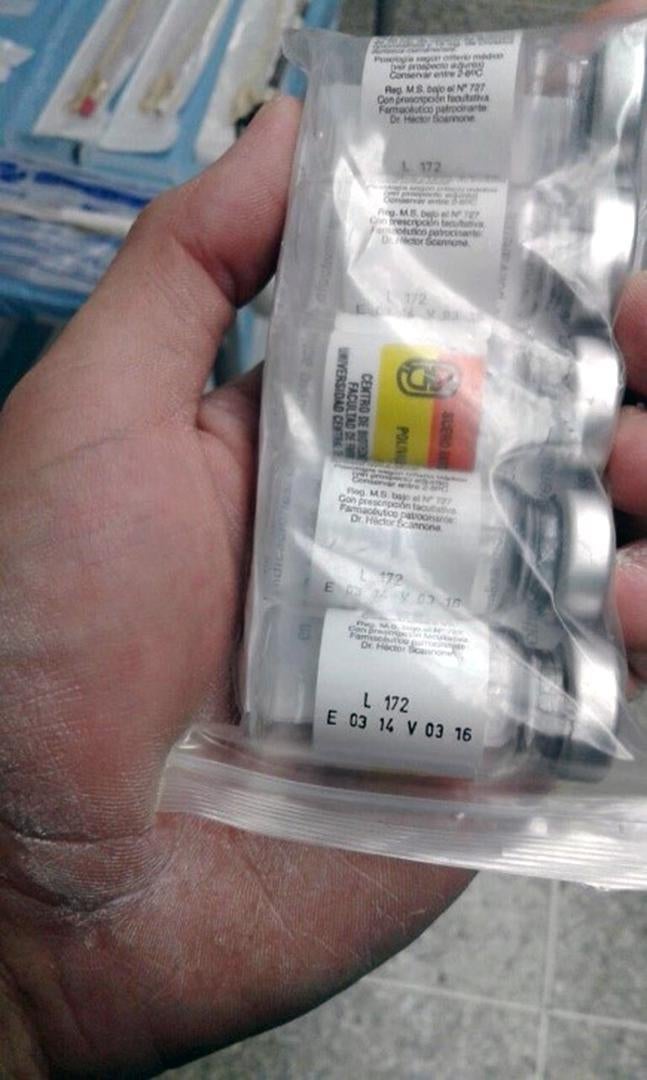 A doctor at Leopoldo Manrique Terrero Hospital in Coche, Caracas, shows vials of expired anti-venom used in the absence of fresh supplies, August 2016. Anti-venom is on the World Health Organization List of Essential Medicines. 