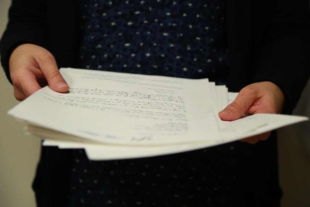 Canadian students taking part in an exercise to urge Justin Trudeau to sign the Safe Schools Declaration and help end attacks on and military use of schools.