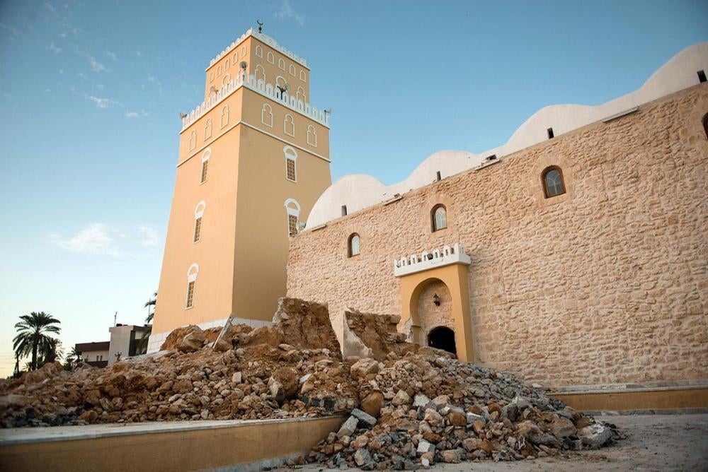 5.	Partial destruction of Murad Agha mosque by unidentified assailants, Tajora, November 2013. © Nader Elgadi