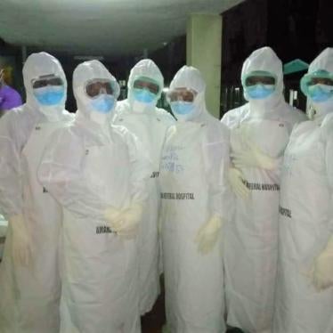 Healthcare workers treating Covid-19 patients in Tanzania wear personal protective equipment used to protect against the transmission of the disease. The spread of Covid-19 has revealed the harmful impacts of insufficient healthcare investment by African governments, including inadequate supplies of personal protective equipment for healthcare workers. 