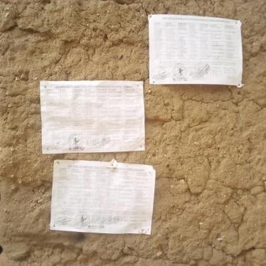 Lists of civilians forced by the military into night guard duty displayed on a wall at the Mozogo market, Far North region, Cameroon. At the bottom of the lists are instructions from local authorities: “Each shift supervisor and each soldier on duty are required to call and notify those who reported for duty and those who did not to punish the latter. The shift begins at 7:00 pm and ends at 4:00 am." April 2020, 