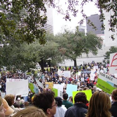 People protest in front of the storm damaged city hall in New Orleans, Louisiana, over the city’s response to Hurricane Katrina, 2006.