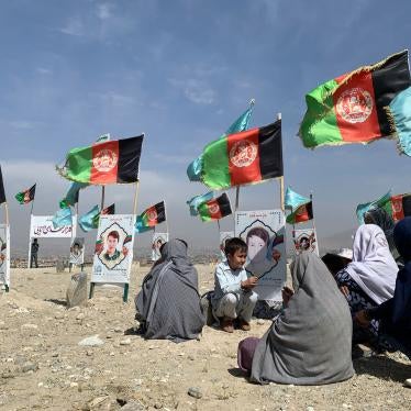 Friends and families of people killed in the conflict gathered in a cemetery to call for a ceasefire from the parties to the intra-Afghan peace talks taking place in Doha, Qatar, September 14, 2020.