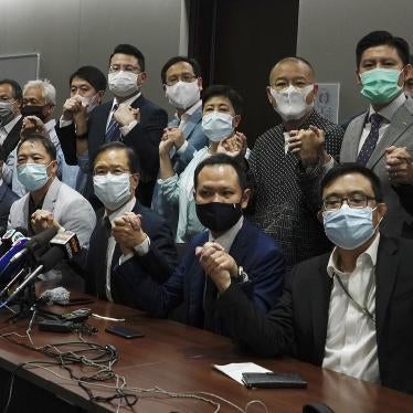 Hong Kong's pro-democracy legislators pose for a photo before a press conference at Legislative Council in Hong Kong, Wednesday, Nov. 11, 2020. 