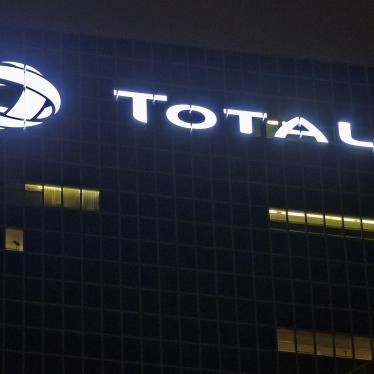 In this file photo, the logo of French oil giant Total SA is pictured at company headquarters in La Defense business district, outside Paris.