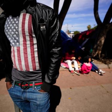  asylum seeker from Haiti waits at a makeshift encampment at the border port of entry