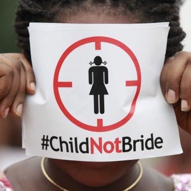 A woman protests against child marriage in Lagos, Nigeria.