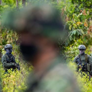 Colombian police officers during an operation in December 2020 to eradicate illicit crops in Tumaco, Nariño state, Colombia. Over three years earlier, in October 2017, seven civilians protesting eradication operations were killed in the same state.