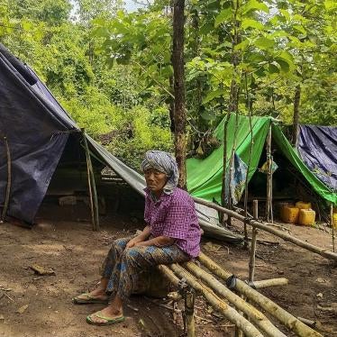 A man sits at a makeshift displacement site in Demoso township, Karenni State, June 17, 2021.